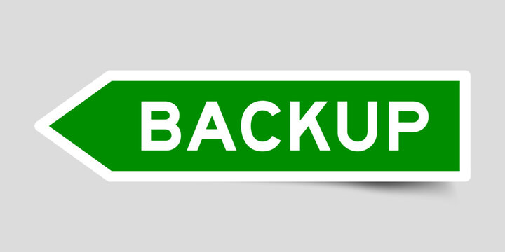 Green color arrow shape sticker label with word back up on gray background