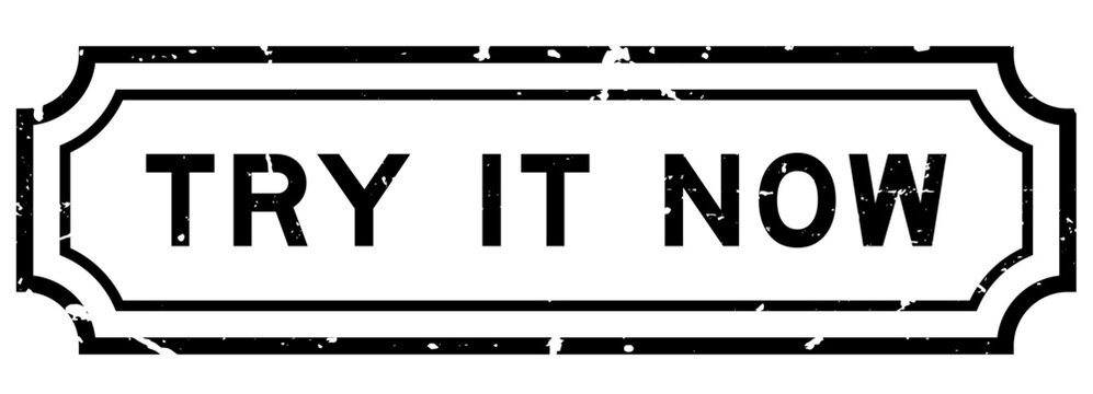 Grunge black try it now word rubber seal stamp on white background
