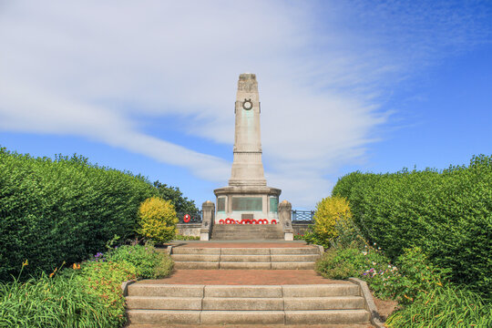 Barrow Park Cenotaph stands in honor of fallen soldiers in Barrow-in-Furness, Cumbria during clear blue sky