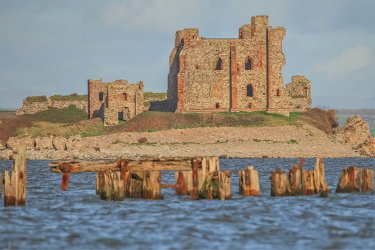 View of piel castle from south walney nature reserve on the cumbrian coast in the united kingdom