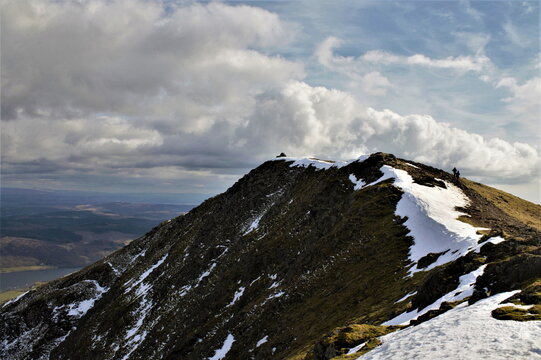 View towards the summit of Coniston Old Man showing ice and snow in English Lake District in Cumbria