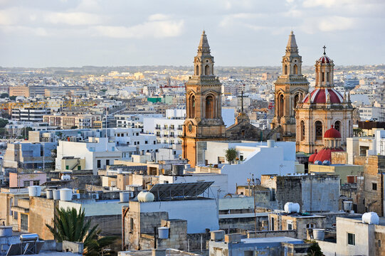 View of Stella Maris Church among buildings in Sliema, Malta near the Mediterranean Sea in Southern Europe