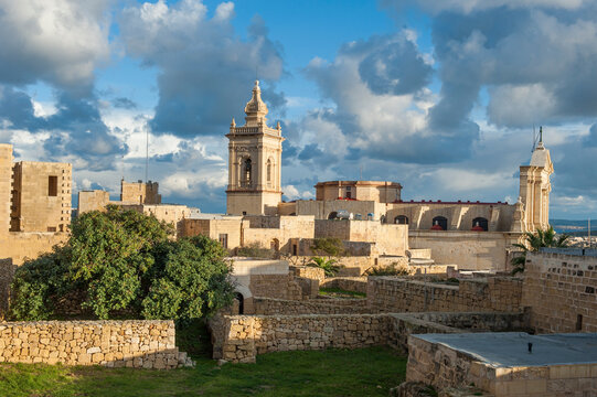Cathedral of the Assumption stands tall in the Cittadella of Victoria at sunset on Gozo Island, Malta