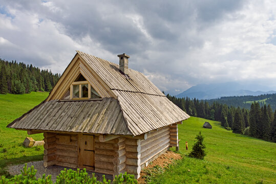 Holiday chalet with Tatra mountains in the background, Brzegi area, Malopolska Province, Poland Central Europe
