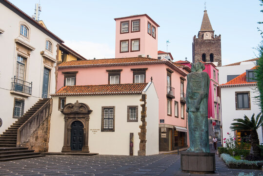 Trilogy of Power bronze statue stands in a small square at Rua dos Capelistas and Rua da Alfandega in Funchal, Madeira, Portugal