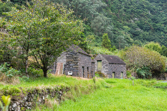 Exploring the stone buildings of Cho da Ribeira near Seixal on the island of Madeira