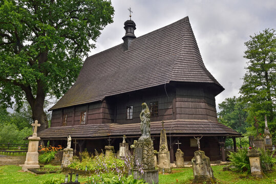 Wooden St. Leonards Church near a cemetery in Lipnica Murowana Poland in the Lesser Poland region
