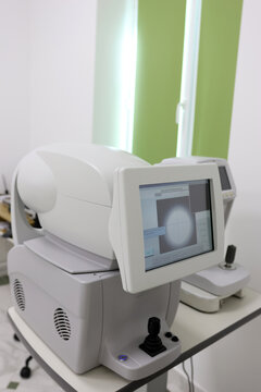 Modern autorefractor in an ophthalmology office for computerized vision diagnostics and eye measurement.