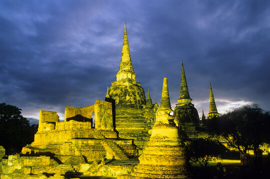 Explore Wat Phra Si Sanphet during evening time at Ayutthaya historical park in Thailand with impressive ruins and structures