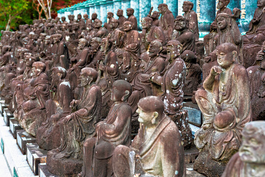 Sculptures of monks and arhats at Nanzoin Temple in Fukuoka, Kyushu, Japan from different angles