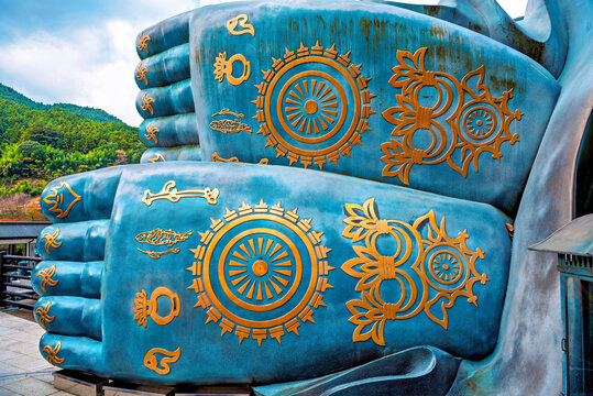 Soles of the Reclining Buddha in Nanzoin Temple show intricate designs and artwork for visitors in Fukuoka Japan