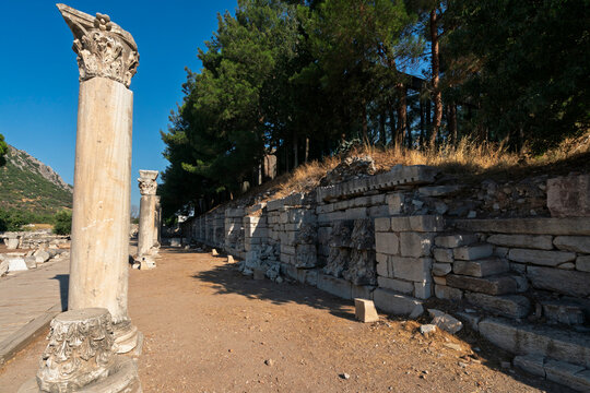 Exploration of ancient ruins and columns at Ephesus archaeological site in Turkey during daytime