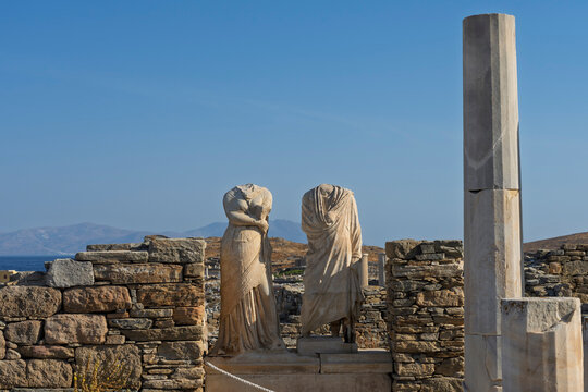 Exploring the remains of the House of Cleopatra in Delos at the archaeological site in Greece