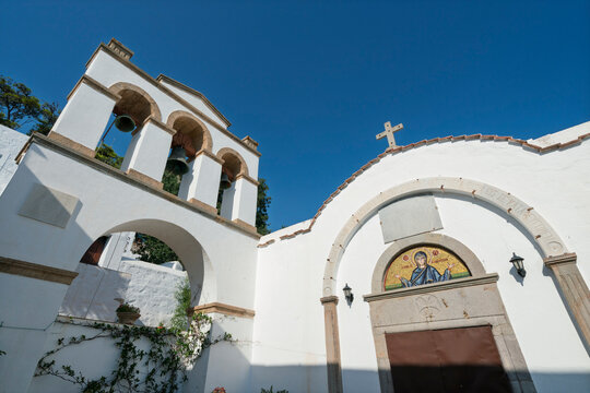 Church of Panagia i Diasozousa located in Chora, Patmos showcases traditional architecture under clear blue sky