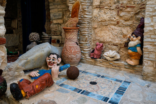 Colorful decorations and sculptures on the blue street in Pythagoreion, Samos Island, Greece