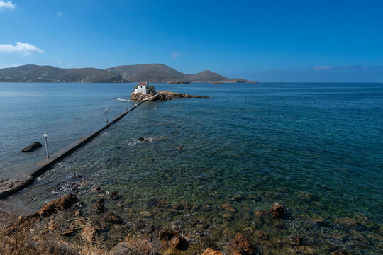 Visit to Agios Isidoros Church on a sunny day in Kokkali, Leros Island in Greece near the sea and coastline with clear blue waters