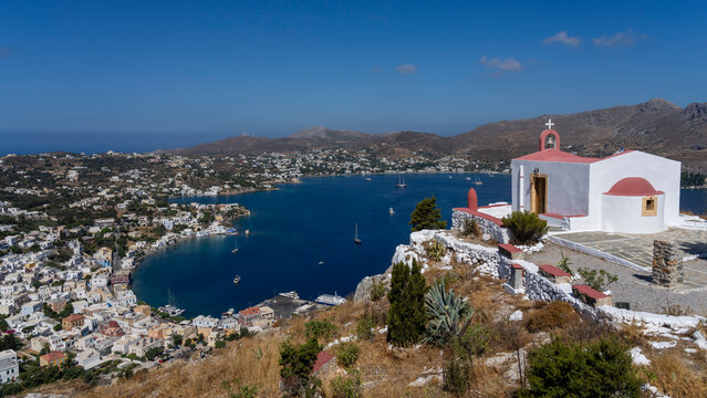 View of Agia Marina with Church of Prophet Elias on Leros Island in Greece during sunny weather