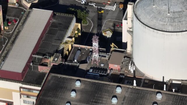 Nuclear energy as an alternative energy source. Operational nuclear power plant. Aerial view. establishing shot.