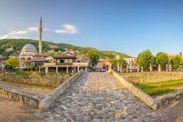 Cobblestone Bridge Leading to the Old Town of Prizren, Kosovo © tichr