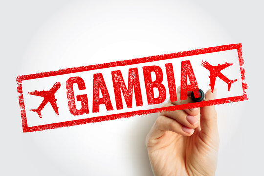 GAMBIA text in a red stamp layout with airplane graphics. Conceptualizing west african tourism, beach holidays, and air transportation services for travelers and commercial cargo