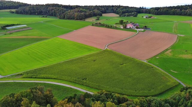 Aerial Drone View Over Colorful Patchwork of Agricultural Fields and Farmland
