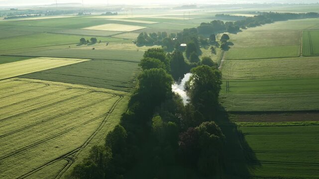  Aerial view on the fields and road. Landscape from drone. Agricultural landscape from air.