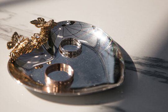 gold ring on white table on wedding backgound with copy space Stock Photo