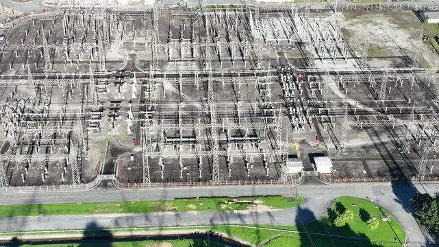 Nuclear energy as an alternative energy source. Operational nuclear power plant. Aerial view. establishing shot.