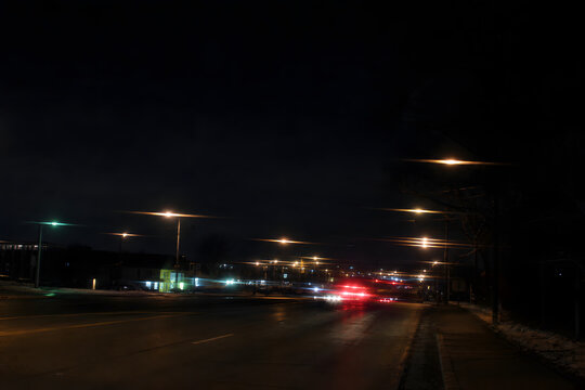 Night streetlights with astigmatic glare and light streaks