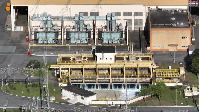 Nuclear energy as an alternative energy source. Operational nuclear power plant. Aerial view. establishing shot.