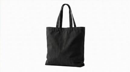 Empty black tote bag with long handles standing upright on white background minimalist style or a plain black reusable tote bag with long handles displayed against a clean white backdrop. © SILVIA MAQQ