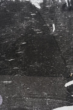 Subtle halftone grunge urban texture with scratches on black background. Distressed overlay texture. Grunge background.