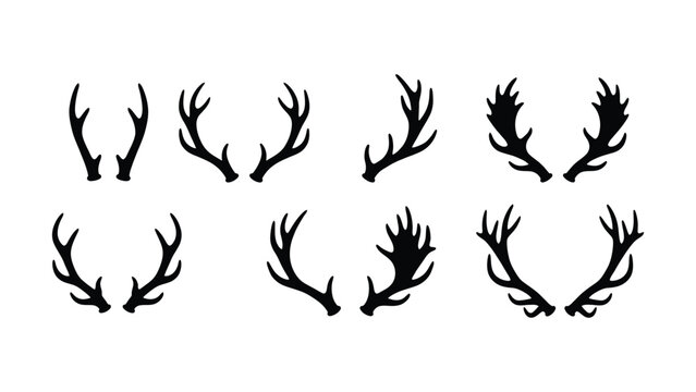 Collection of various black deer antler silhouette designs on white background