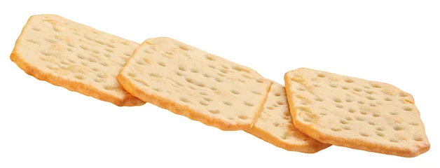 Crispy Crackers isolated on white background.  Flying  dry crackcers. Viewed from above. © nataliazakharova