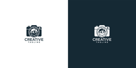 Fototapeta premium Creative Photography Logo Design Featuring a Camera Lens with a Mountain Landscape Scene for Nature Travel Branding
