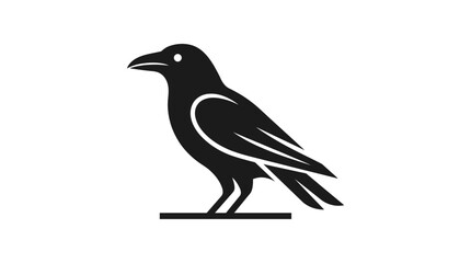 Fototapeta premium A black bird stands on a line facing left in profile view