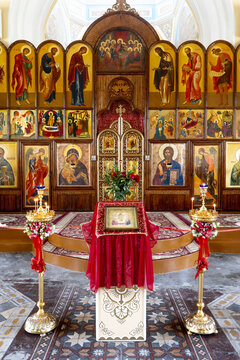 Interior view of St. Alexius Orthodox Cathedral showing icons, altar, and decor in Samarkand Uzbekistan