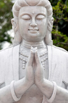 Sculpture of Guan Yin at Vinh Trang Pagoda shows the bodhisattva of compassion in My Tho Vietnam