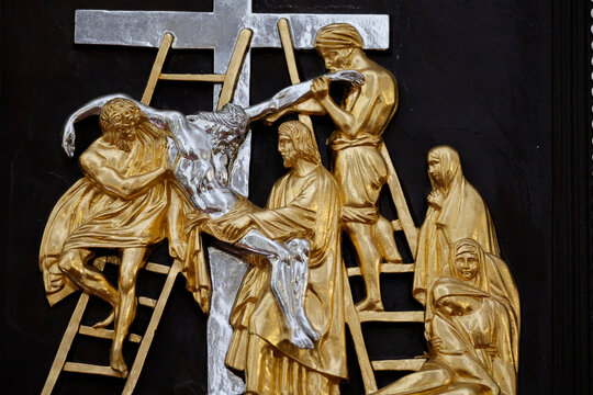 Jesus is taken down from the cross at Station 13 in My Tho cathedral during the Way of the Cross event in Vietnam