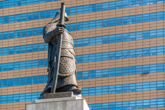 View of the Statue of Admiral Yi Sun-sin in Gwanghwamun Plaza on a sunny day in Seoul, South Korea