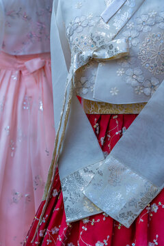 Colorful Korean hanboks showcased near Gyeongbokgung Palace in Seoul, South Korea during the day