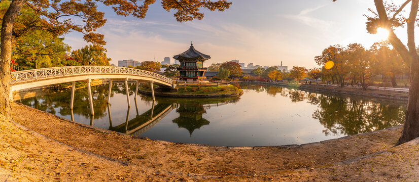 View of Hyangwonjeong Pavilion at Gyeongbokgung Palace during golden hour in autumn in Seoul, South Korea