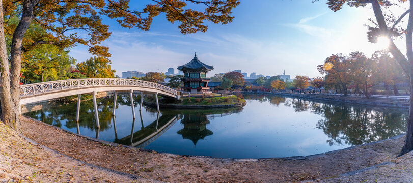 View of Hyangwonjeong Pavilion at Gyeongbokgung Palace during golden hour in autumn in Seoul, South Korea