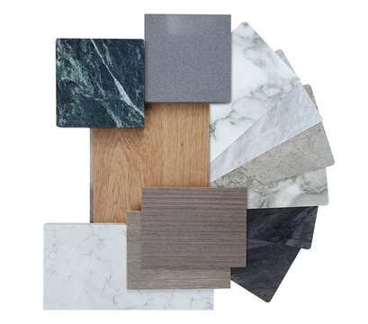 Interior design material samples palette board isolated on white background. Collection of marble tiles, wood grain panels, quartz stone, and granite swatches for home renovation moodboard.