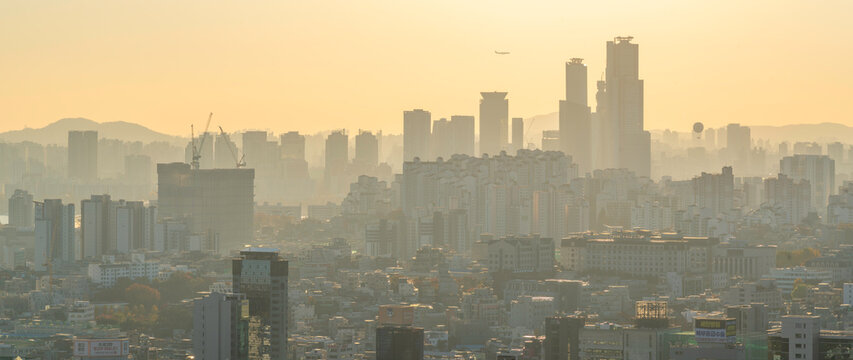 View of Seoul skyline from N Seoul Tower at golden hour in autumn Yongsan District South Korea