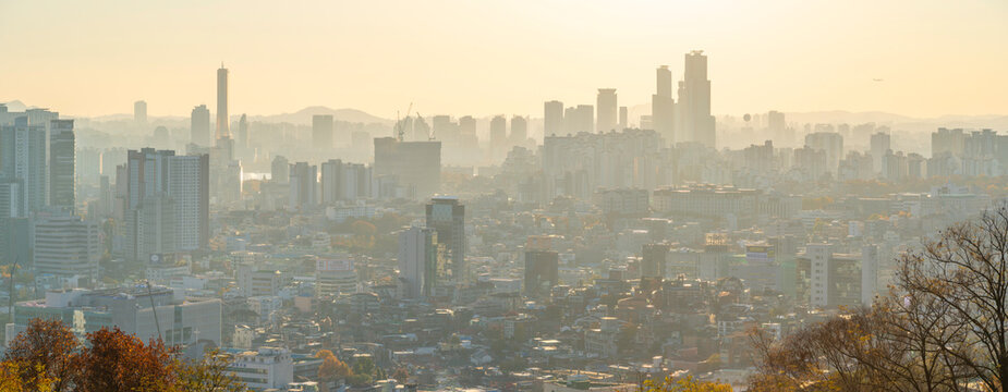 View of Seoul skyline during golden hour in autumn from N Seoul Tower in Yongsan District, South Korea