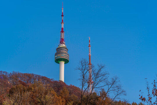 View of N Seoul Tower on a clear autumn day with blue sky in Yongsan District in South Korea