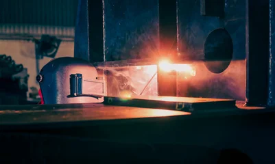Welding steel structures and bright sparks in construction industry. © nuttawutnuy