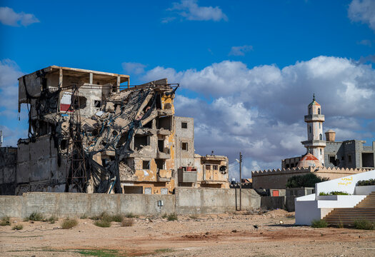 Destruction in Benghazi shows damage to buildings and structures in the area after conflict and instability