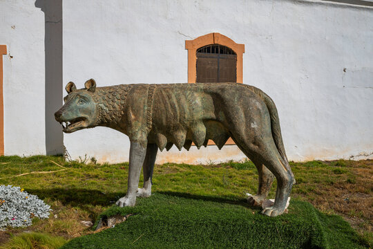 Statue of a wolf figure in front of a historic building in Benghazi Libya